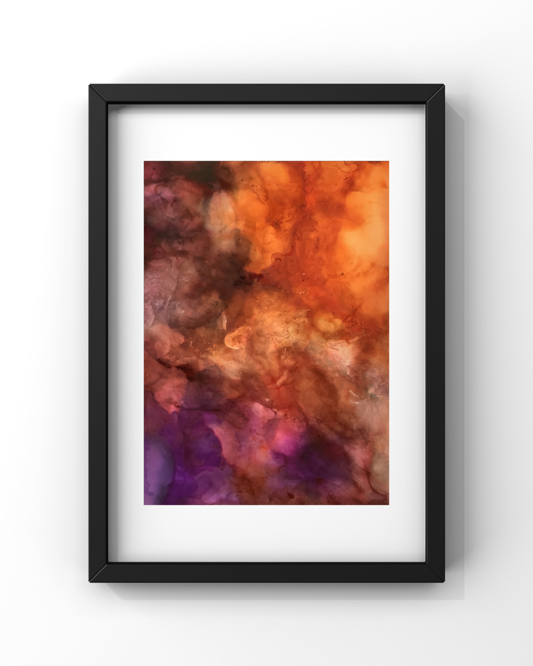 Alive — a framed alcohol ink painting glowing with warm amber, coral, and deep violet blooms