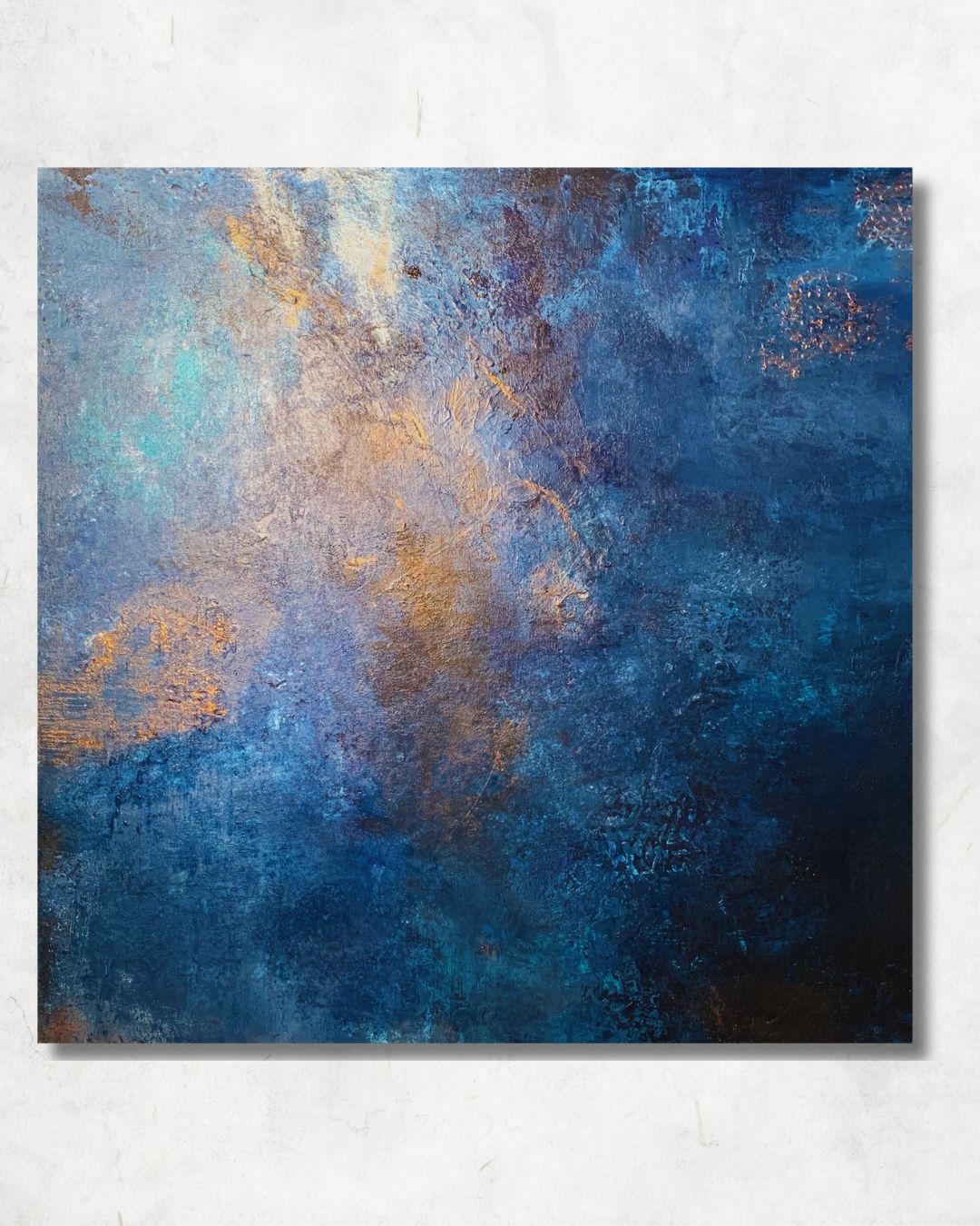 Wonderwall (Nancy & Tony) — a 24 by 24 inch mixed media painting in deep blue with copper and gold texture